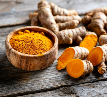 Curcumin turmeric extract powder close-up, natural yellow pigment