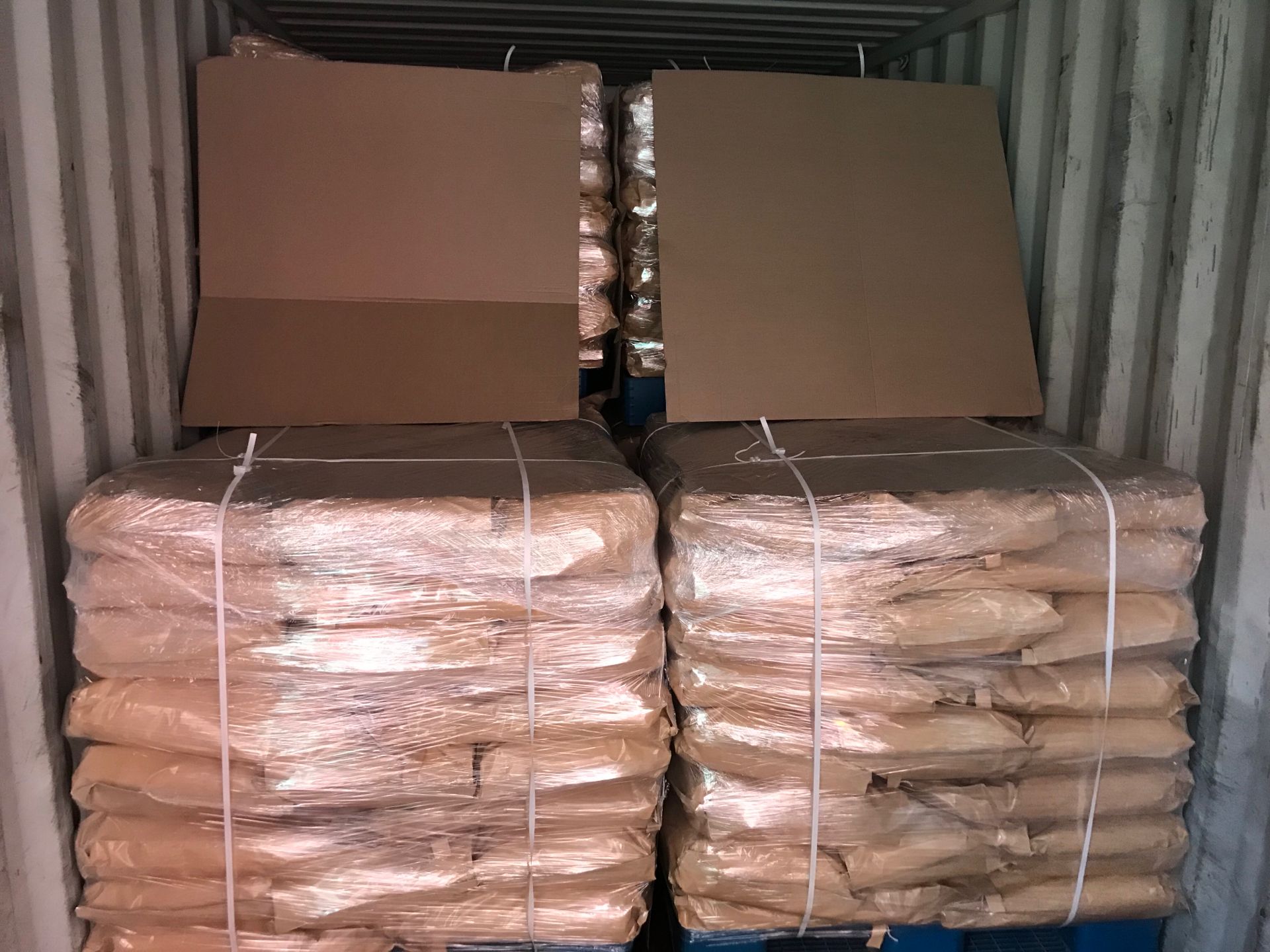 Container loading of Hydroxypropyl Beta Cyclodextrin HPBCD bags on pallets for export shipment